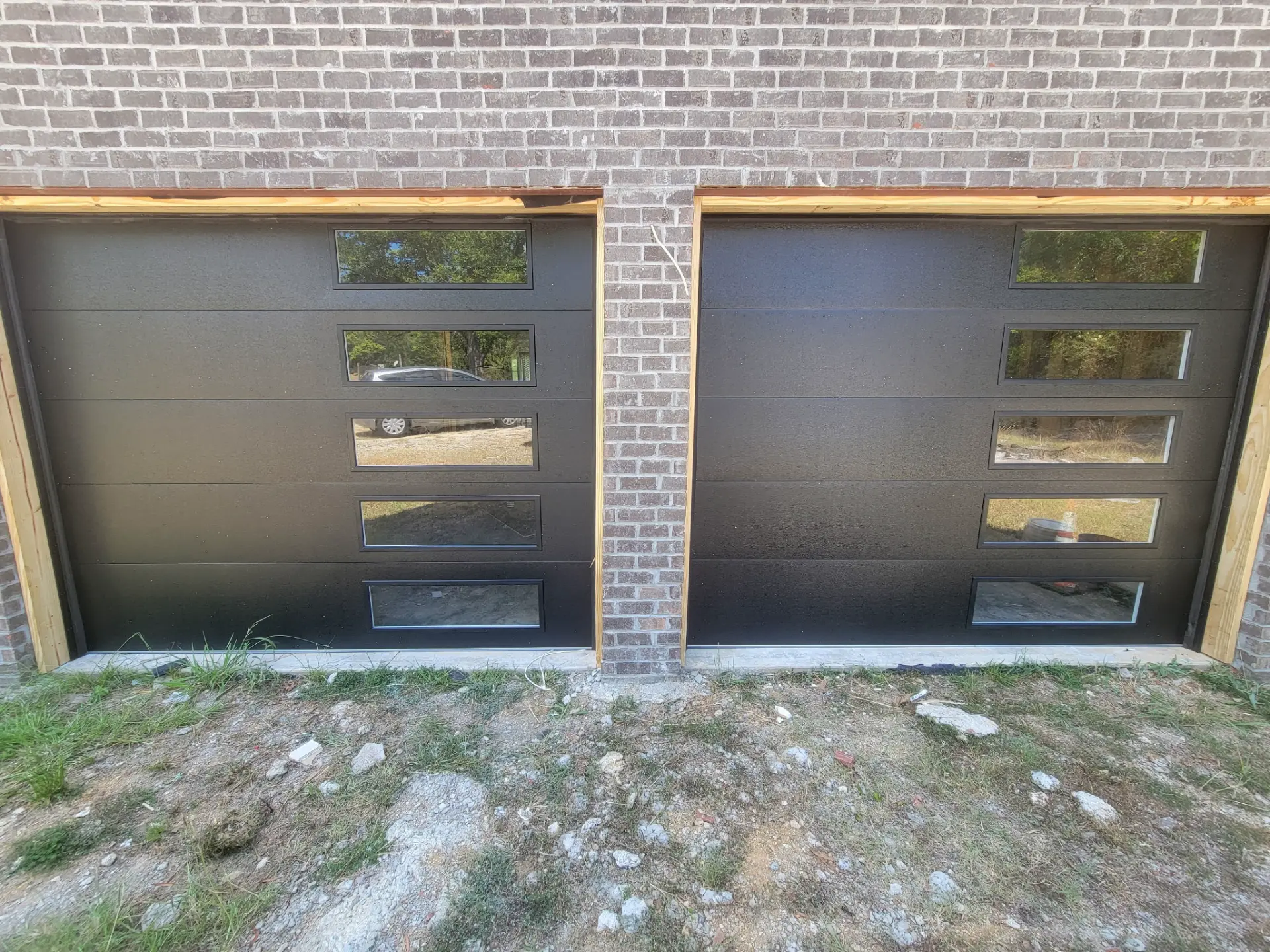 Modern black garage door installation